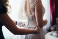 Bride tied white dress