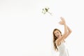 Bride tossing bouquet.