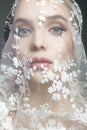 Bride under a veil. beautiful female lovely Face