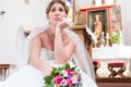 Bride waiting alone for wedding being frustrated