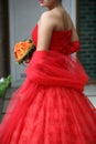 Bride, wearing silk red gown