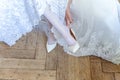 The bride wears shoes