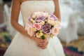 Bride with wedding bouquet in park Royalty Free Stock Photo