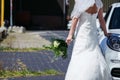 Bride in Wedding Dress going on the honeymoon Royalty Free Stock Photo