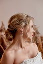 Bride in wedding dress, lace neckline. Profile, red lipstick. Royalty Free Stock Photo