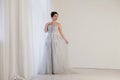 Bride in wedding dress in white room Royalty Free Stock Photo