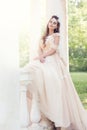 Bride Wedding Outdoor Portrait, Beautiful Fashion Model in Elegant Dress, Happy Woman Dreaming in park Royalty Free Stock Photo