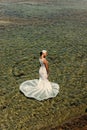 Bride in a wet wedding dress. Woman in white wedding dress Royalty Free Stock Photo