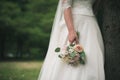 bride in white dress holding bouquet Royalty Free Stock Photo