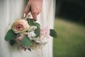 bride in white dress holding bouquet Royalty Free Stock Photo