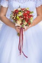 Bride in White Dress Holding Splendid Bridal Boquet Royalty Free Stock Photo