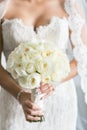 Bride with White Rose Wedding Bouquet