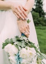 bride white wedding dress flowers hands conceptual Royalty Free Stock Photo