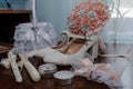 Bride& x27;s accessories. Women& x27;s shoes leather, garter, bridal bouquet, candles, pendant Royalty Free Stock Photo