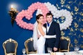 Bridegroom and bride at banquet Royalty Free Stock Photo