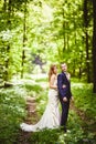 Bridegroom and bride in the spring forest Royalty Free Stock Photo