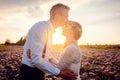 Bridegroom kissing his bride during romantic wedding in the village Royalty Free Stock Photo