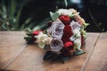 Brides bouquet with red roses Royalty Free Stock Photo