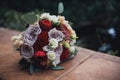 Brides bouquet with red roses Royalty Free Stock Photo