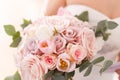 Brides bouquet of roses, tulips and eucalyptus Royalty Free Stock Photo