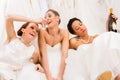 Brides drinking too much in wedding shop Royalty Free Stock Photo