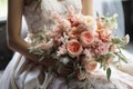 Brides hands adorned with David Austin bouquet, a fragrant emblem of loves union