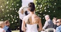 The brides on her way to say I do. Rearview shot of an unrecognizable lesbian bride walking towards the altar on her