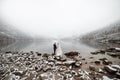 Brides mountain near the lake in winter. Tender couple in love