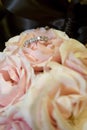 Brides ring in her bridal bouquet Royalty Free Stock Photo