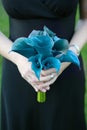 Bridesmaid Holding Blue Bouquet