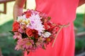 Bridesmaid holding bridal bouquet Royalty Free Stock Photo