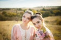 Bridesmaids in pink dresses with bouquets Royalty Free Stock Photo