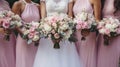 Bridesmaids in pink dresses and bride holding beautiful bouquets. Beautiful luxury wedding blog concept. Summer wedding Royalty Free Stock Photo