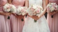 Bridesmaids in pink dresses and bride holding beautiful bouquets. Beautiful luxury wedding blog concept. Summer wedding Royalty Free Stock Photo