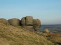 The bridestones a large group of gritstone rock formations in west yorkshire landscape near todmorden against pennine countryside Royalty Free Stock Photo