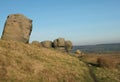 a large group of gritstone rock formations in west yorkshire landscape near todmorden against pennine countryside Royalty Free Stock Photo