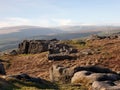 Bridestones moor in west yorkshire with gritstone outcrops surrounded by hills on a sunny day Royalty Free Stock Photo