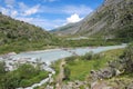 Bridge across the Akkem river. Belukha mountain national park. Altai Mountains, Russia Royalty Free Stock Photo