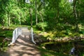 Bridge across pond in Botanical Park, Palanga, Lithuania Royalty Free Stock Photo