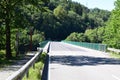 Bridge across the reservoir lake of river Our near Vianden Royalty Free Stock Photo