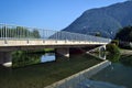 Bridge across the river, reflected in water Royalty Free Stock Photo