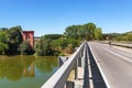 Bridge across Tanaro river in Italy. Royalty Free Stock Photo