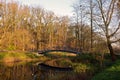 Bridge reflected in water in a park