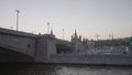 Bridge on background of red Square. Action. Floating under bridge with view of Kremlin's Red Square. Urban landscape