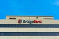 Bridge Bank logo and sign is displayed on headquarters of Silicon Valley based financial institute. Bridge Bank is a division of