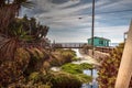 Bridge and Beach cottages line Crystal Cove State Park beach