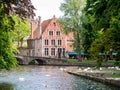 Bridge, canal and old house on Wijngaardplein square in Bruges, Belgium