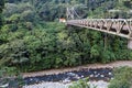 Bridge for cars over a river in Costa Rica jungle