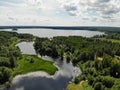 Bridge with cars on the river at green summer. Aerial drone view. Flying over. Royalty Free Stock Photo