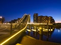 A bridge in the city at night. City lights. The Galaxy Bridge, Purmerend, Netherlands.